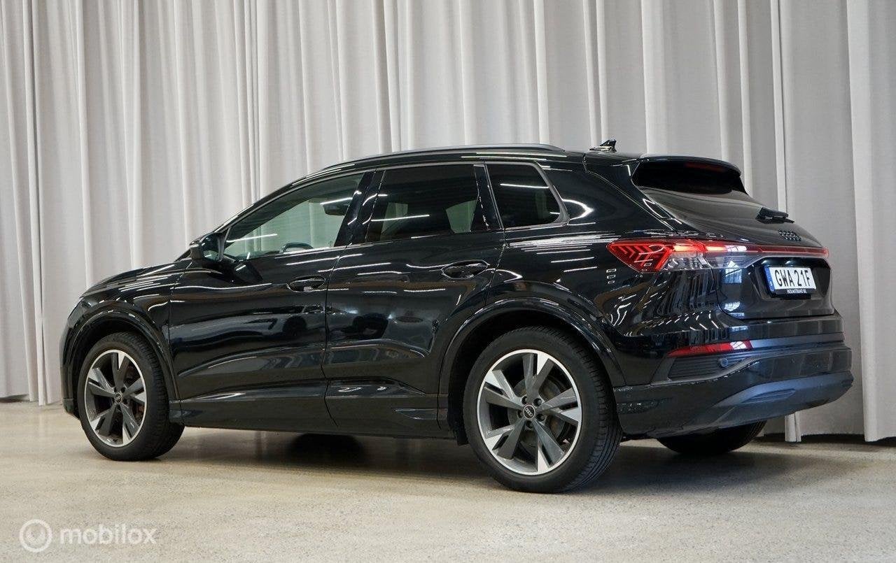 Audi Q4 e-tron 40 77 kWh SONOS, warmtepomp, Auto's, Automaat, Dealer onderhouden, Zwart, 511 km