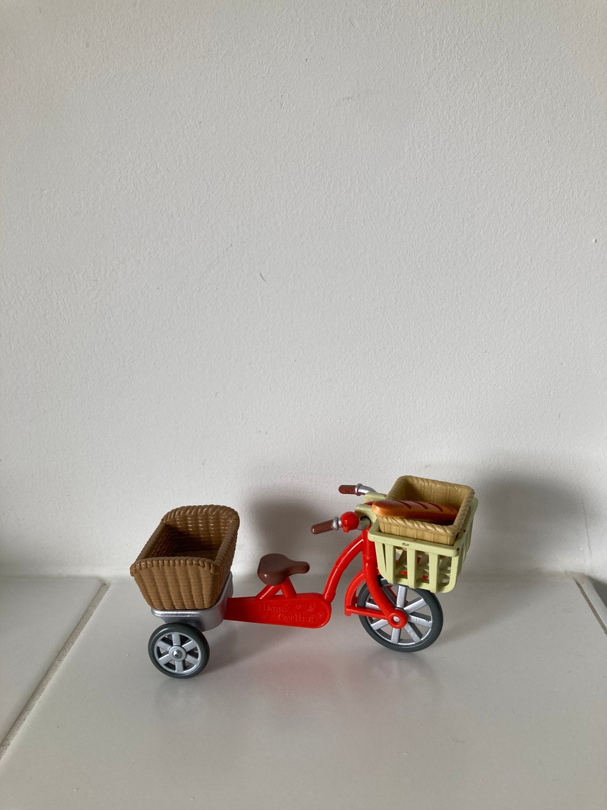 Sylvanian Families bakfiets met stokbrood en mandje, Verzamelen, Ophalen of Verzenden, Gebruikt, Poppenhuis
