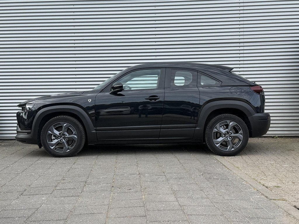 Mazda MX-30 e-SkyActiv R-EV 170 Exclusive-line | Carplay | C, Auto's, Mazda, Stof, Gebruikt, Automatische klimaatregeling, Zwart