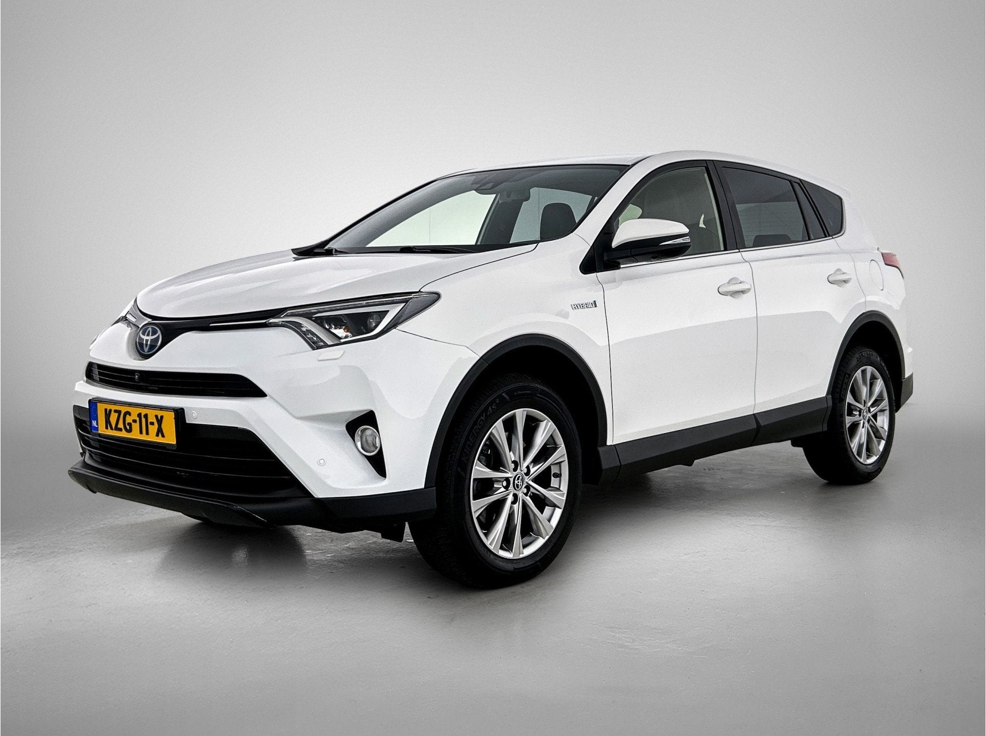 Toyota RAV4 2.5 Hybrid Executive (bj 2018, automaat), Auto's, Wit, Leder, Bedrijf, 155 pk