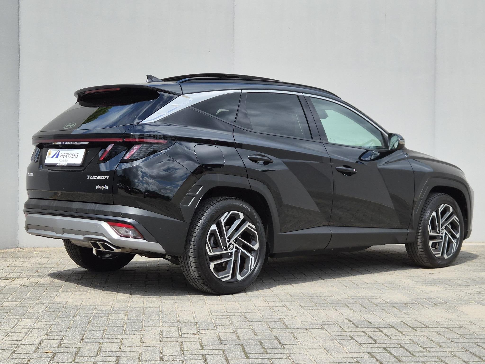 Hyundai Tucson 1.6 T-GDI PHEV Premium Sky / Fabrieksgarantie, Auto's, 14 kWh, Gebruikt, Euro 6, 4 cilinders