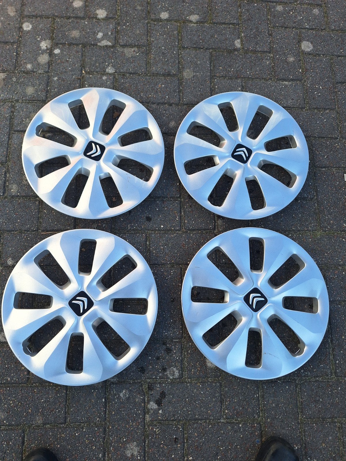 Set van 4 originele Citroën 15 inch wieldoppen C1, Auto diversen, Ophalen, Gebruikt