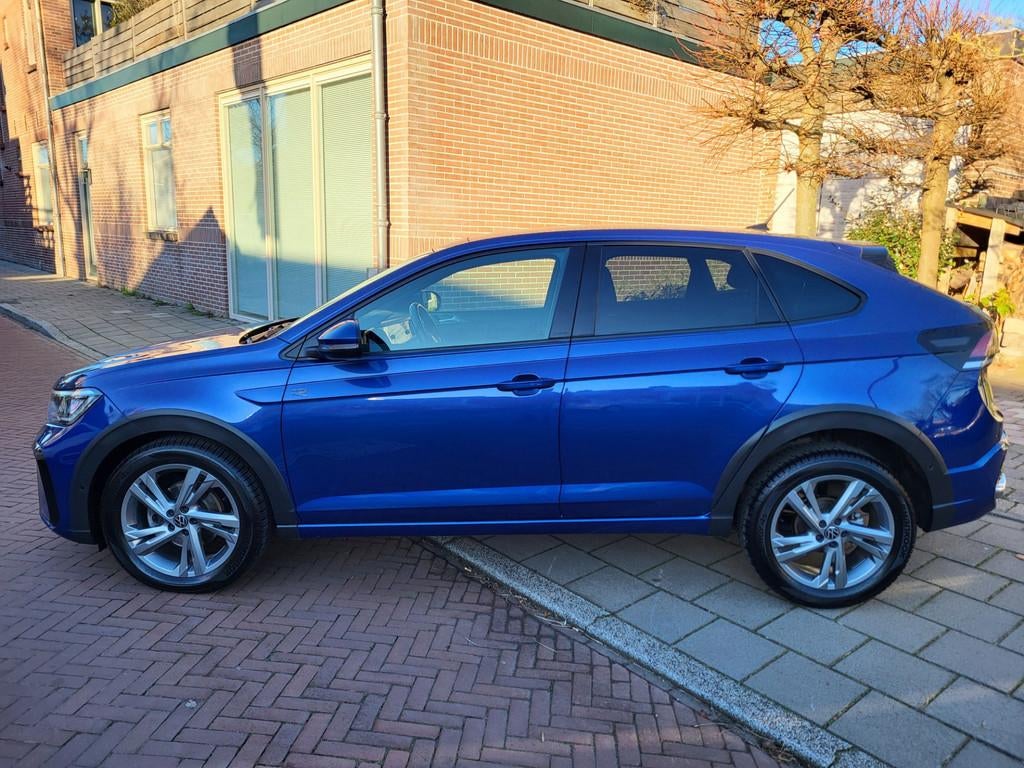 Volkswagen TAIGO 1.0 TSI R-Line Edition, 12 maanden, Stof, Gebruikt, Blauw