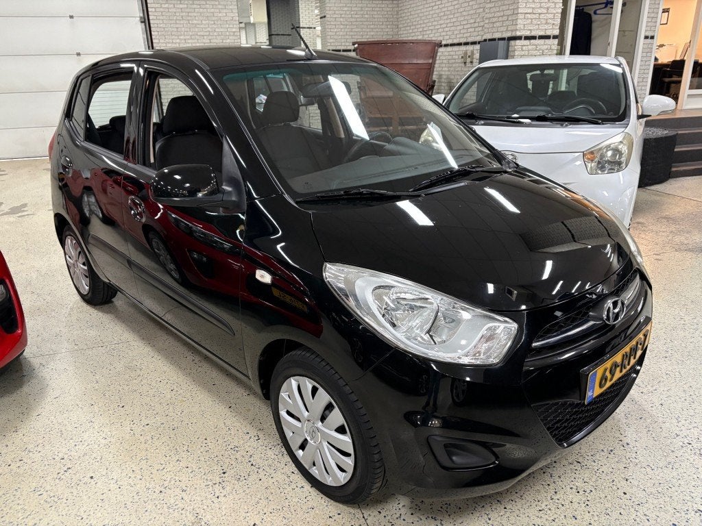 Hyundai I10 1.1 I-DRIVE COOL / AIRCO / USB / AUX / IPOD / IS, Euro 5, Gebruikt, 4 cilinders, Met garantie (alle)