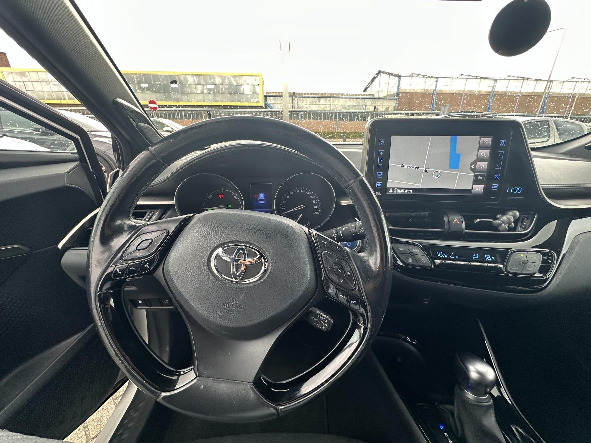 Toyota C-HR 1.8 Hybrid Style Ultimate lichtmetalen velgen 18, Auto's, Automatische klimaatregeling, Stof, Euro 6, 4 cilinders