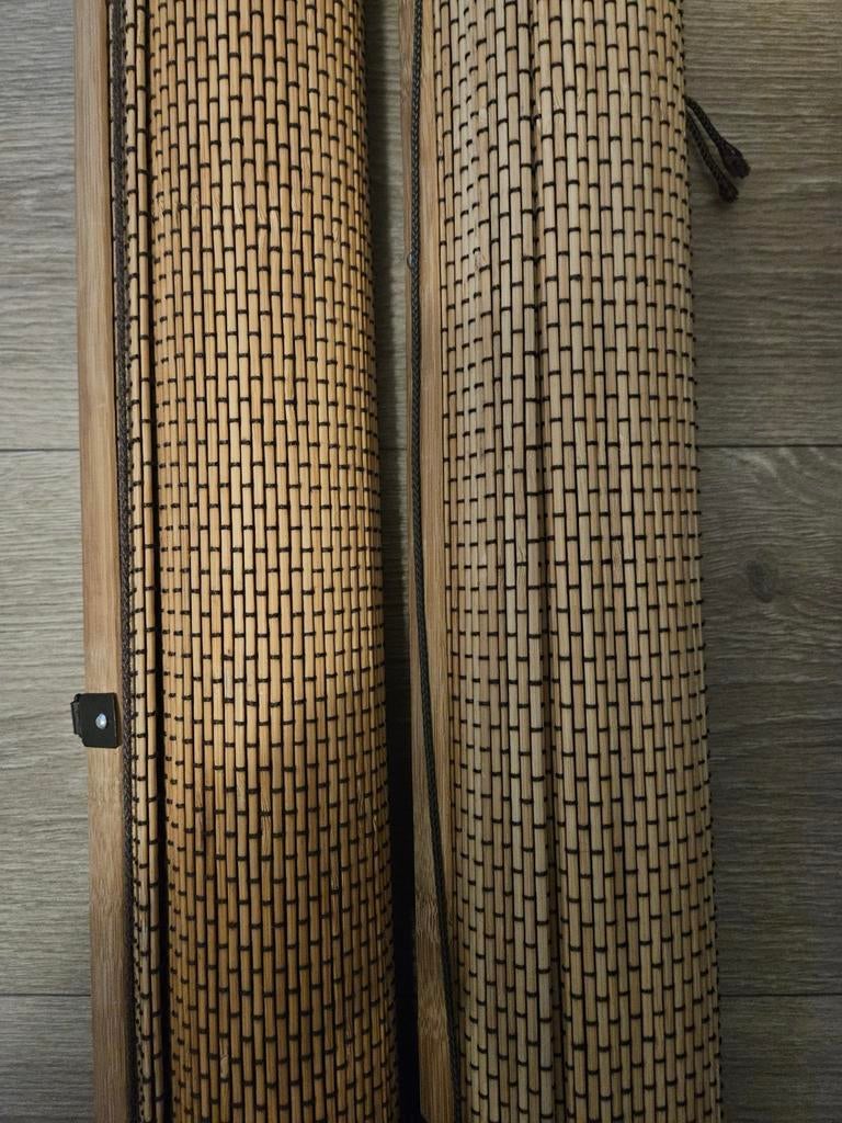 Bamboe rolgordijnen., Ophalen