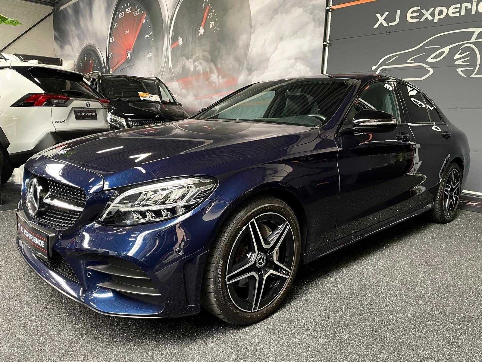 Mercedes-Benz C-klasse 160 AMG NIGHT LEER LED FACELIFT Elekt, Automaat, Dealer onderhouden, Blauw, Automatische klimaatregeling