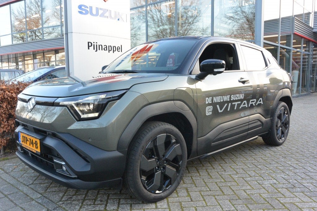 Suzuki E-VITARA STYLE 61 KWH AUTOMAAT - VOLLEDIG ELEKTRISCH, Auto's, Gebruikt, 44 min, Met garantie (alle), 61 kWh