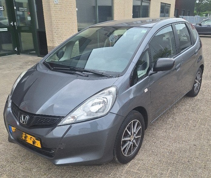 Honda Jazz 1.2 2013 Grijs * airco * PDC achter * NL auto, Voorwielaandrijving, 40 €/maand, 4 cilinders, 1198 cc