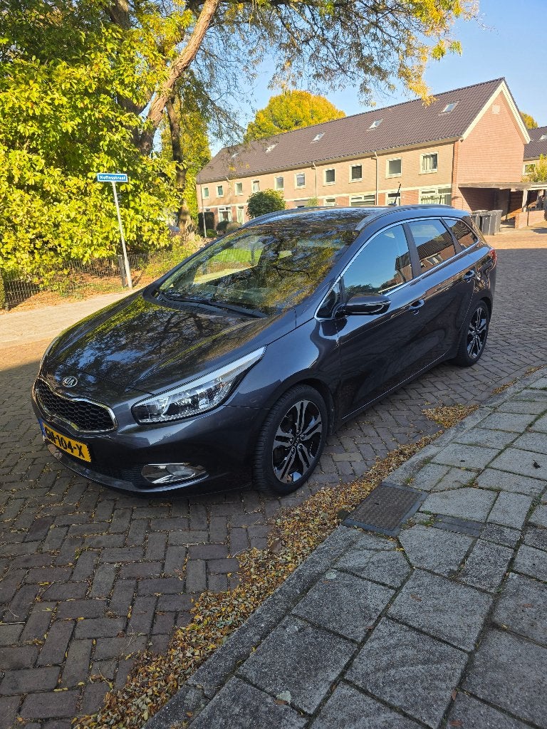 Kia (Pro) Cee d 1.6 GDI Sporty Wagon 2015 Grijs, Auto's, Voorwielaandrijving, Verwarmde buitenspiegels, 1591 cc, 4 cilinders