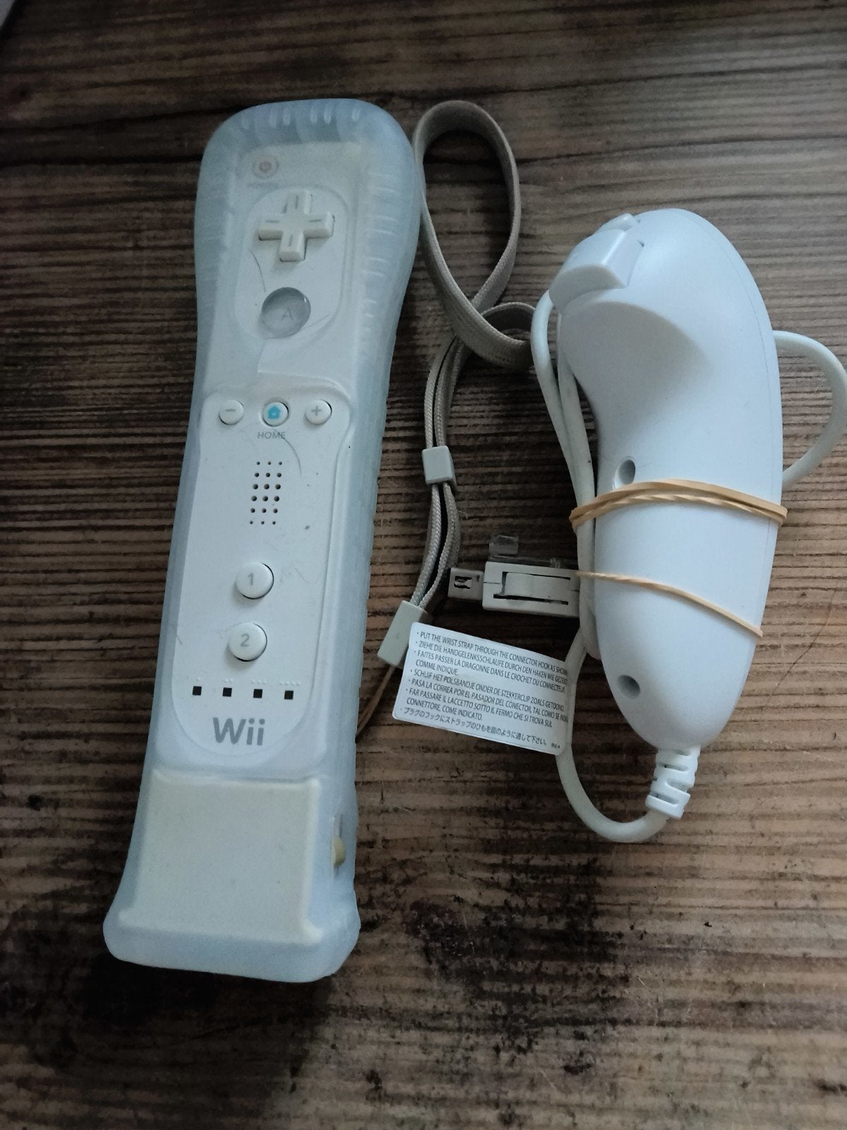 Wii afstandsbediening met Nunchuk en hoesje, Spelcomputers en Games, Ophalen of Verzenden, Gebruikt, Met 1 controller