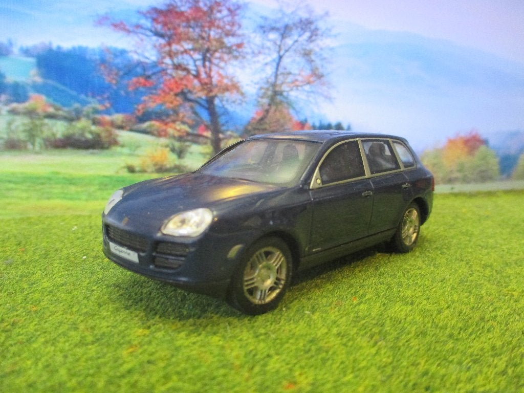 1/43 Porsche Cayenne - Cararama donkerblauw-metallic, Hobby en Vrije tijd, Modelauto's | 1:43, Ophalen of Verzenden, Gebruikt