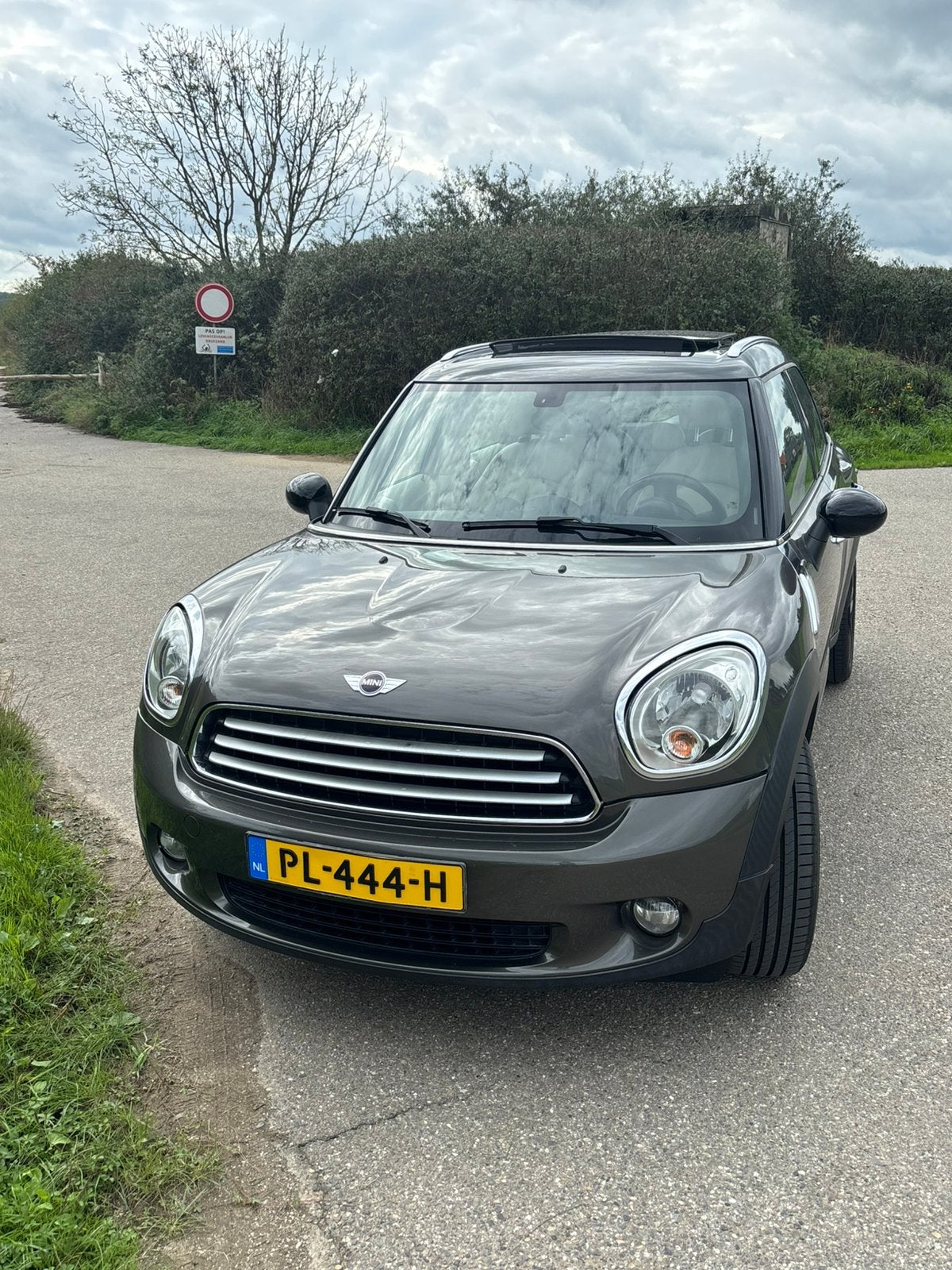 Zeer mooie mini countryman te koop!, Auto's, Voorwielaandrijving, Beige, Countryman, Leder