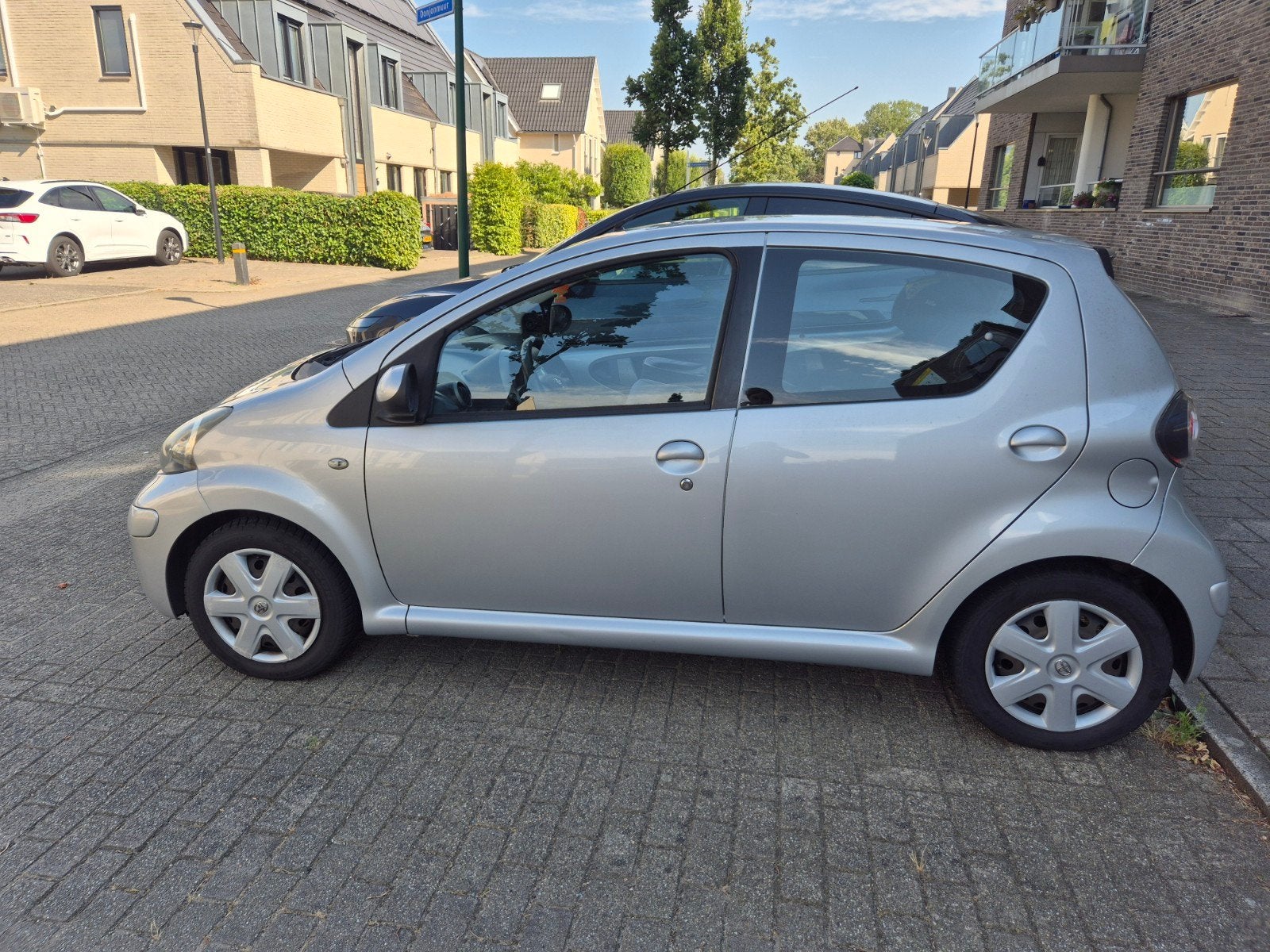 Toyota Aygo 1.0 12V Vvt-i 5DRS 2010 Grijs, Auto's, Toyota, Voorwielaandrijving, 4 stoelen, 68 pk, Origineel Nederlands