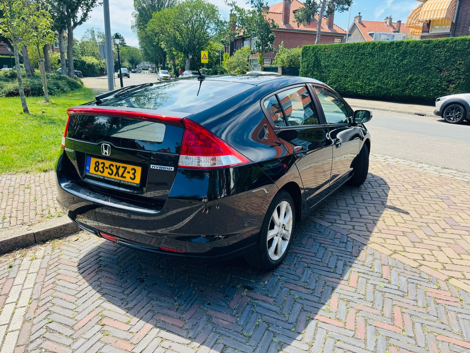 Honda Insight 1.3 Hybrid AUT 2011 Zwart, Auto's, Honda, 4 cilinders, Zwart, Origineel Nederlands, 22 km/l