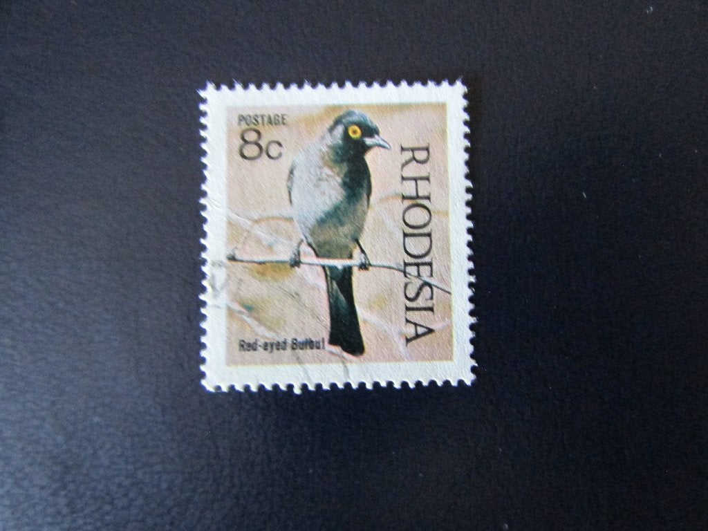 Postzegel Vogel: Afrikaanse Rood-ogige Buulbuul uit Rhodesië, Ophalen of Verzenden, Gestempeld, Dier of Natuur