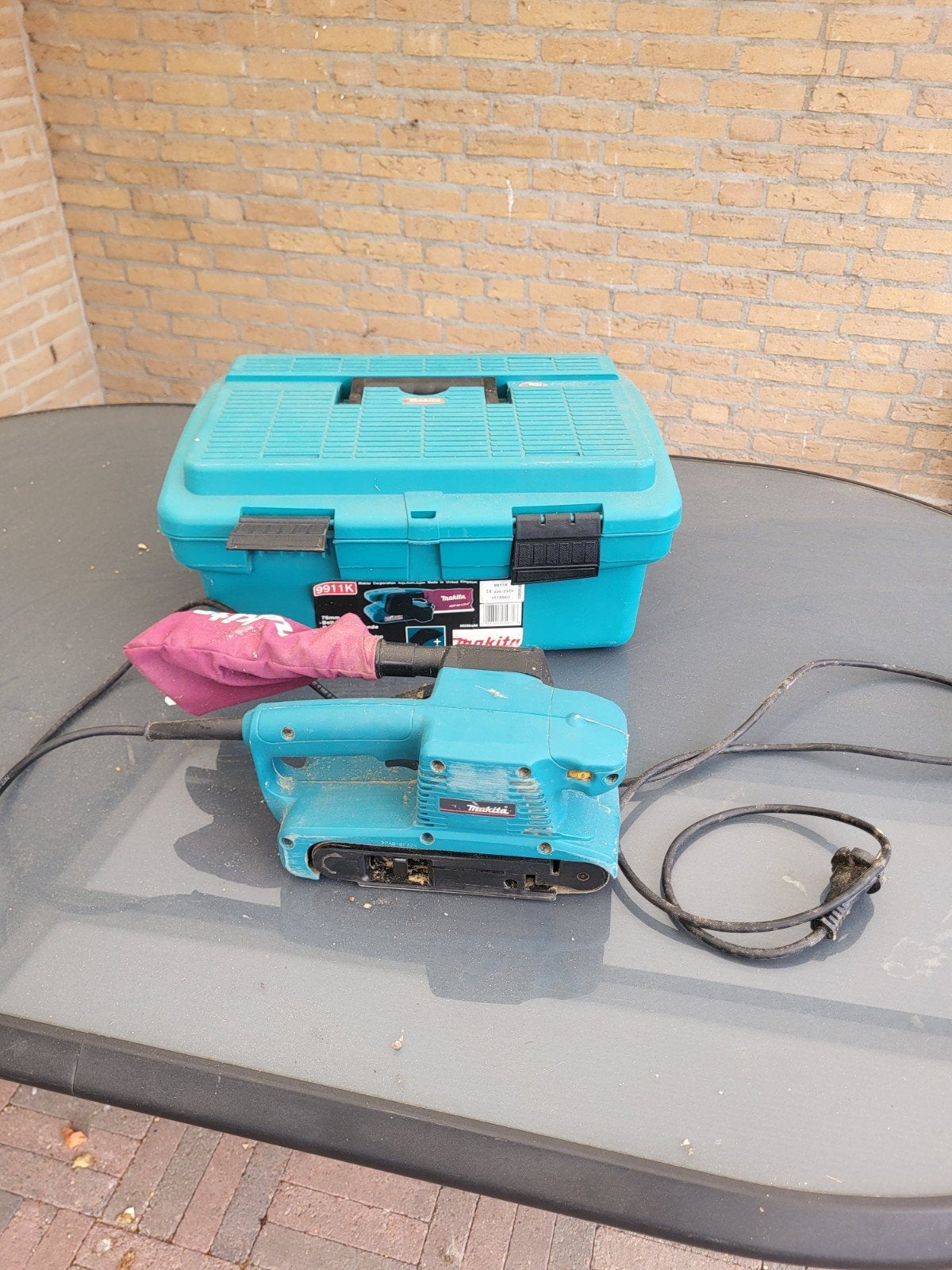 Makita Bandschuurmachine met koffer, Ophalen