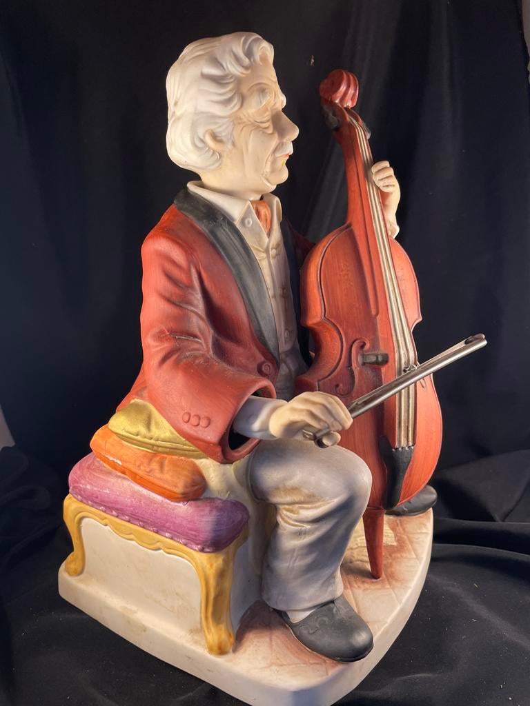 Beeldje van man met cello., Ophalen of Verzenden