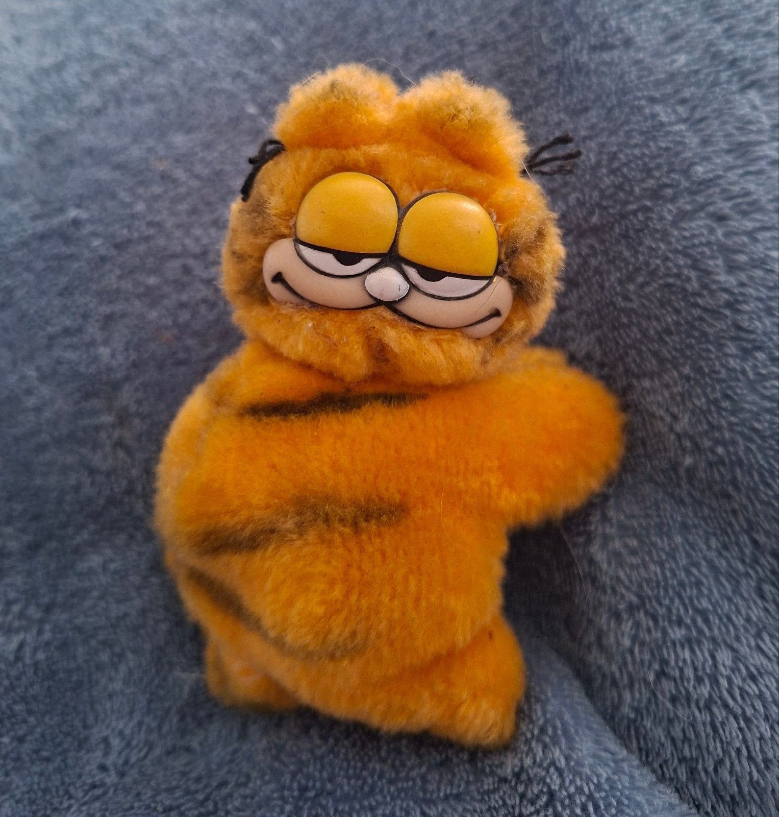 Garfield knijp poppetje, Ophalen