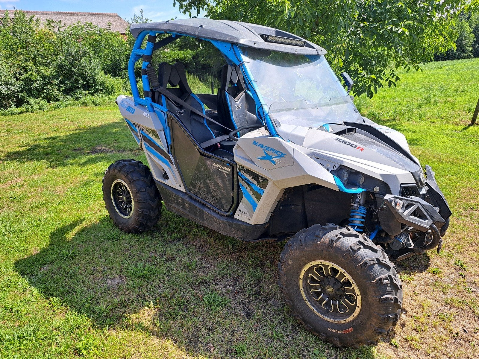 Can-Am Maverick 1000R - Krachtige Side-by-Side, Motoren, Quads en Trikes