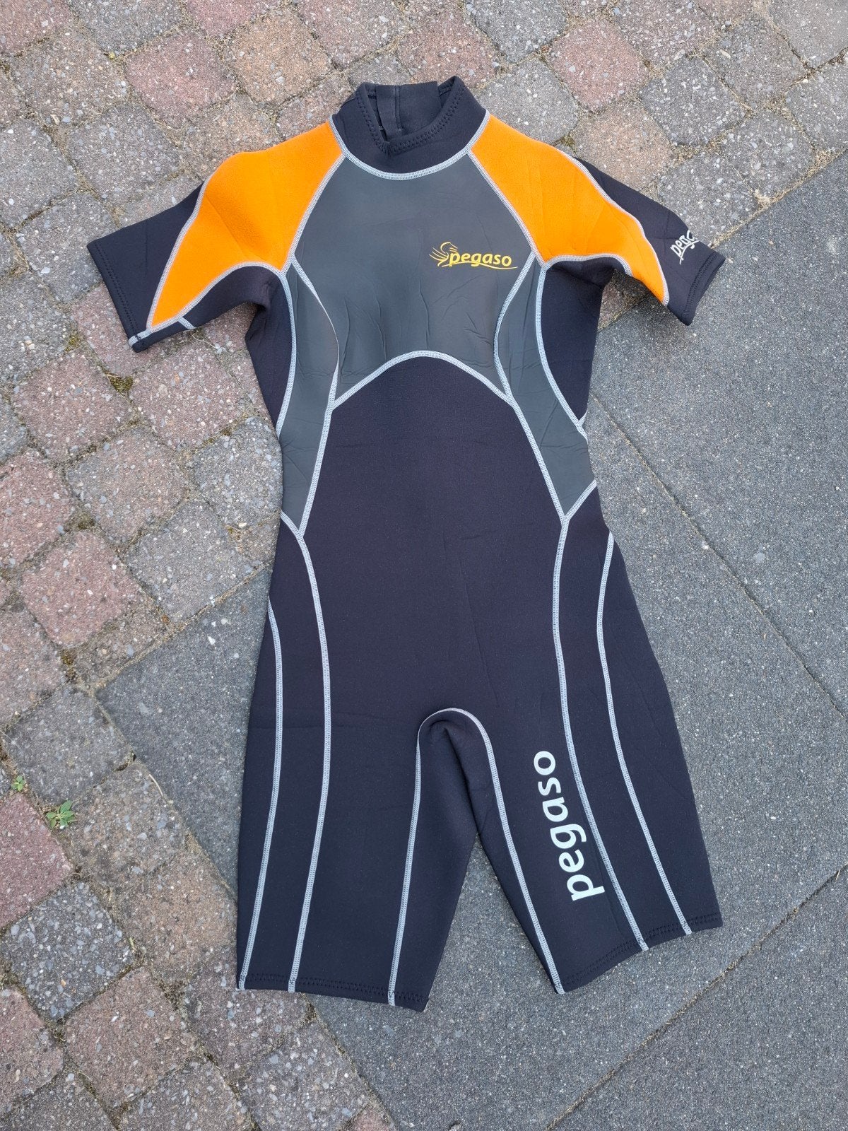Oranje wetsuit pegaso dames S/M, Ophalen of Verzenden, Dame, Wetsuit
