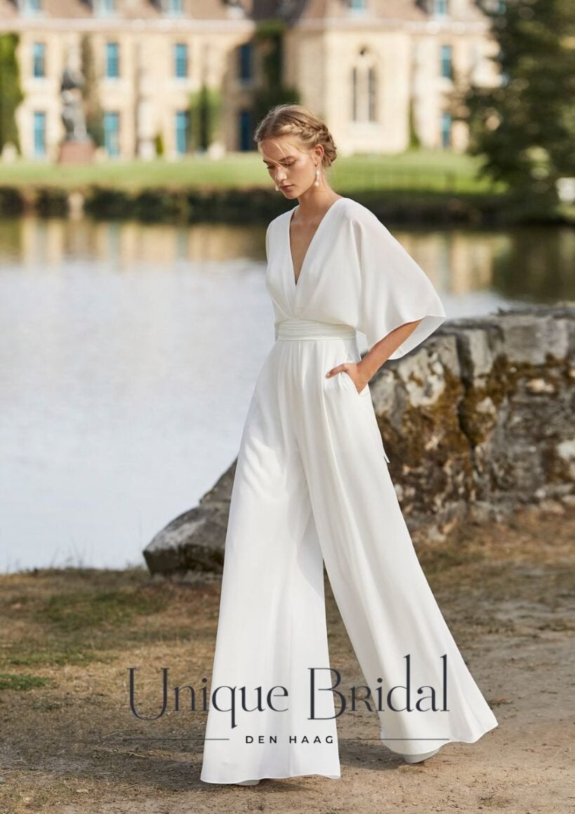 Jumpsuit trouwjurk de waddox, Ophalen of Verzenden, Zo goed als nieuw, Wit, Trouwjurk