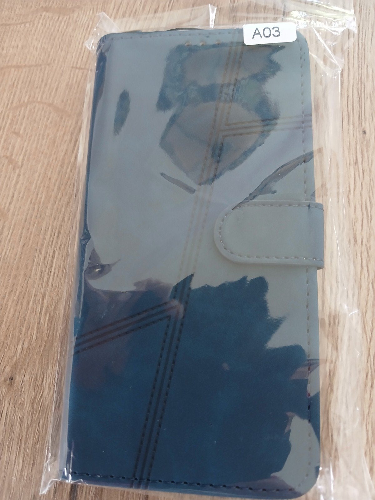 Telefoonhoesje, Ophalen, Nieuw