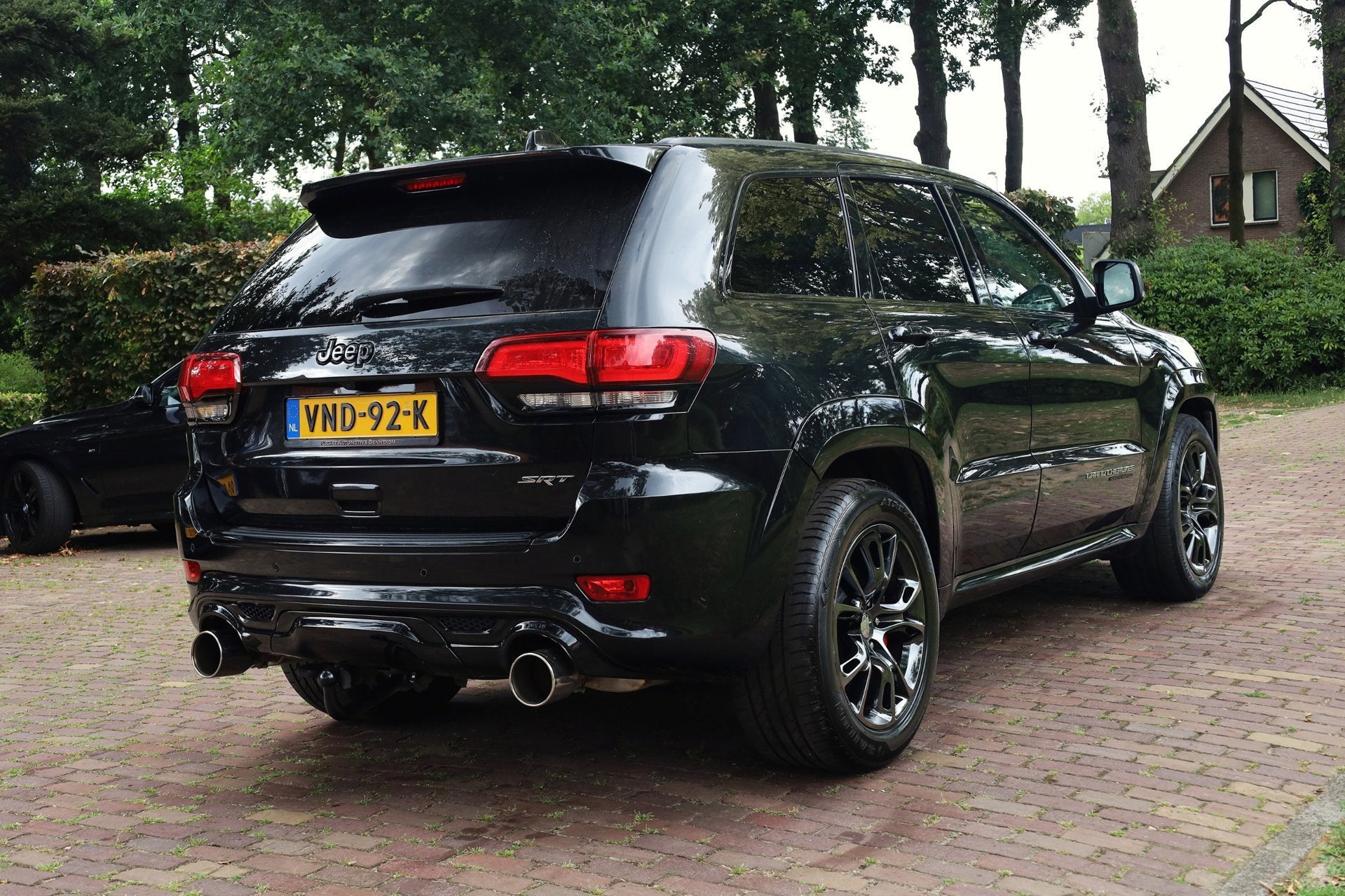Jeep Grand Cherokee 6.4 V8 SRT8 Aut. | Grijs Kenteken | LPG-, Gebruikt, Zwart, Leder, Bedrijf