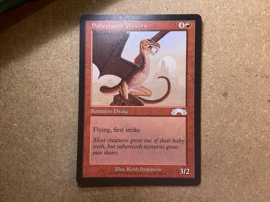 1x Sabertooth Wyvern [099/143] (Excellent), Ophalen of Verzenden, Zo goed als nieuw, Losse kaart