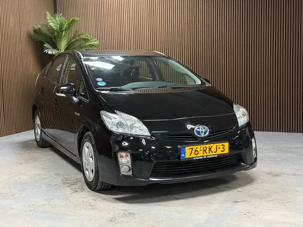 Toyota Prius 1.8 Comfort (bj 2011, automaat), Auto's, Gebruikt, 4 cilinders, Zwart, Origineel Nederlands