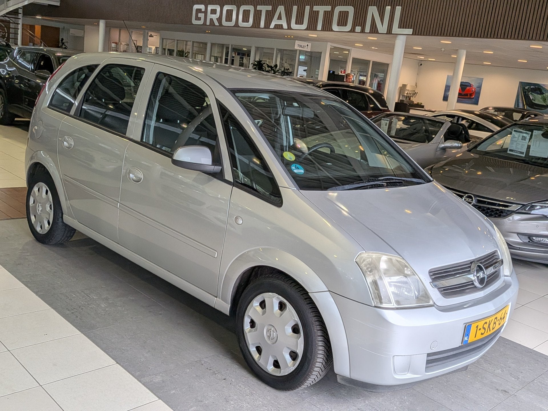 Opel Meriva 1.6-16V Essentia Airco, Stuurbekrachtiging Autom, Auto's, Gebruikt, 4 cilinders, 14 km/l, Grijs