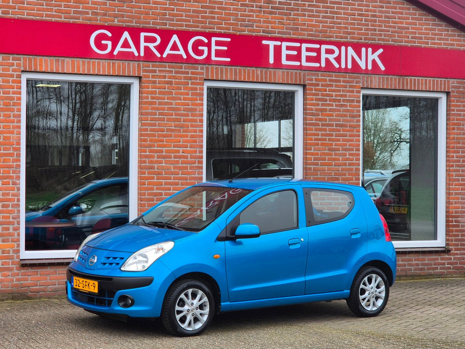 Nissan Pixo 1.0 Acenta 68PK 5drs airco, elektr.ramen, stuurb, Auto's, Nissan, Voorwielaandrijving, Euro 5, Stof, Gebruikt