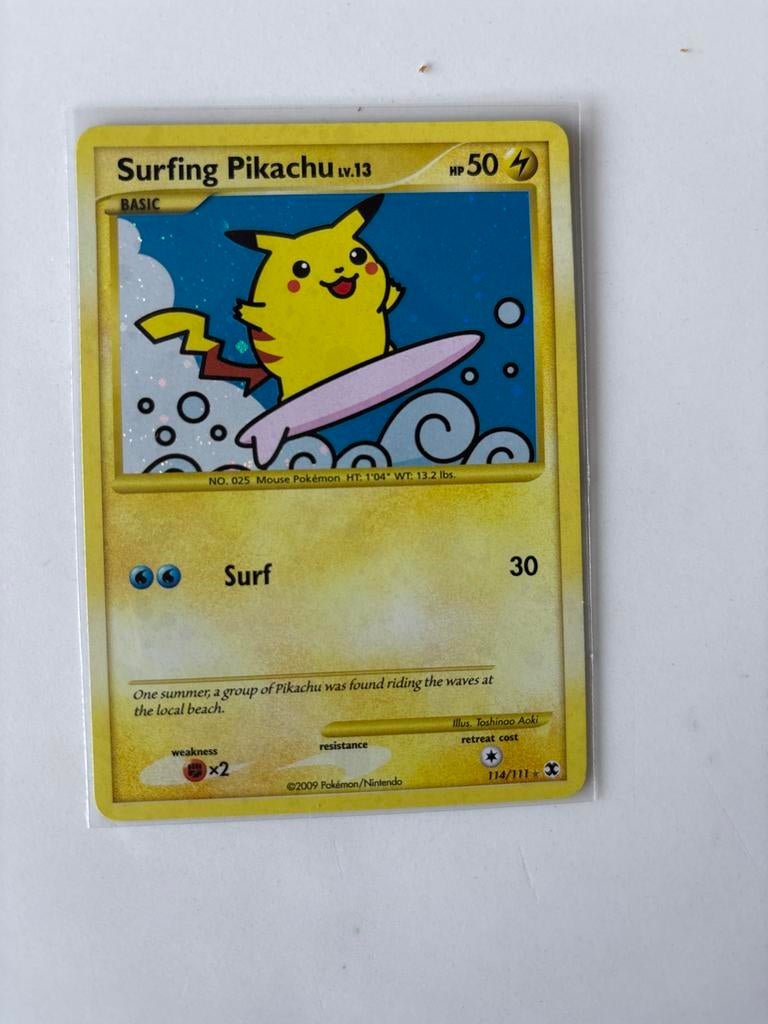 Surfing Pikachu Pokémon Kaart 114/111 - Zeer Goede Staat, Ophalen, Zo goed als nieuw, Losse kaart