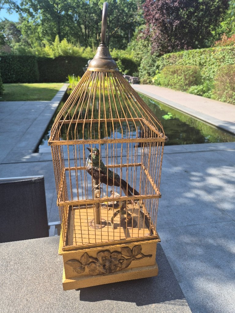 mechanische vogel automaat met tjirpende vogel, Ophalen