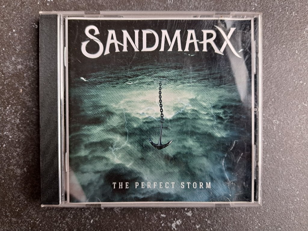 1CD - Sandmarx - The Perfect Storm - Gesigneerd, Cd's en Dvd's, Cd's | Rock, Ophalen of Verzenden, Gebruikt, Overige genres