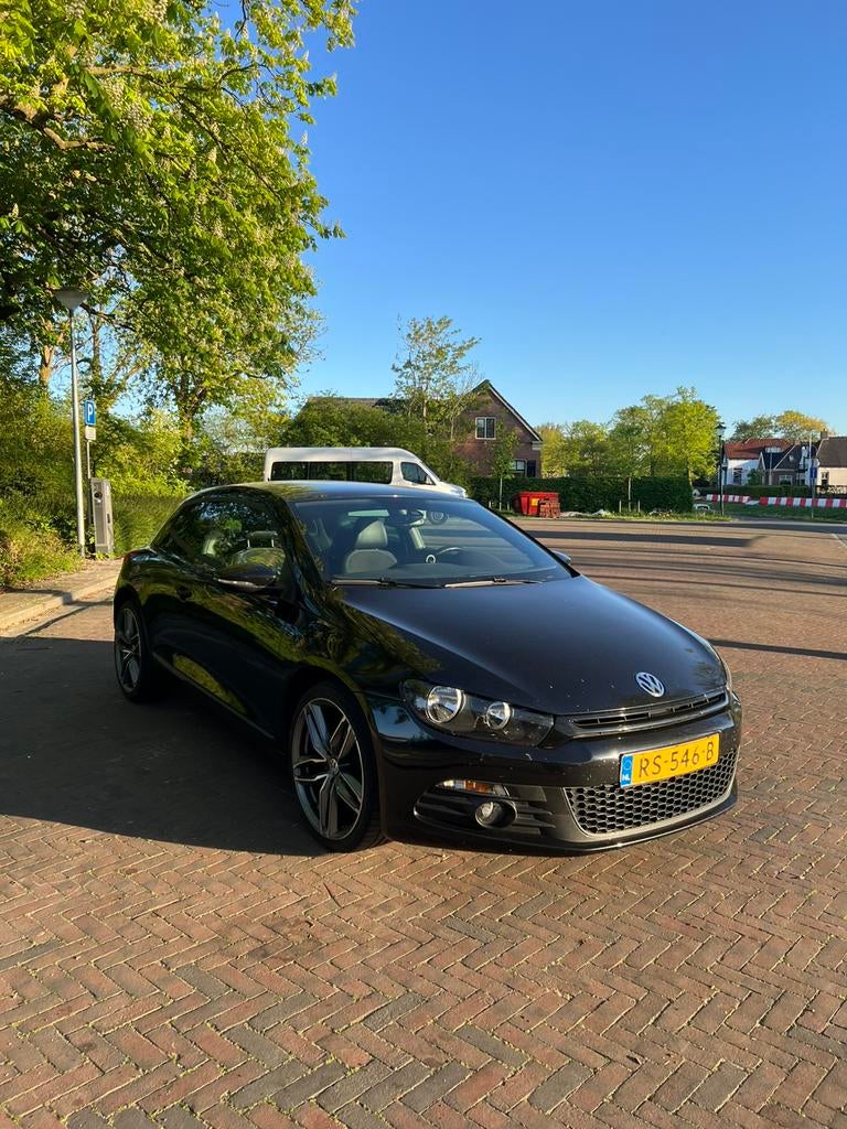 Volkswagen Scirocco 1.4 TSI 118KW DSG 2010 Zwart, Auto's, 4 cilinders, Zwart, Particulier, Geïmporteerd