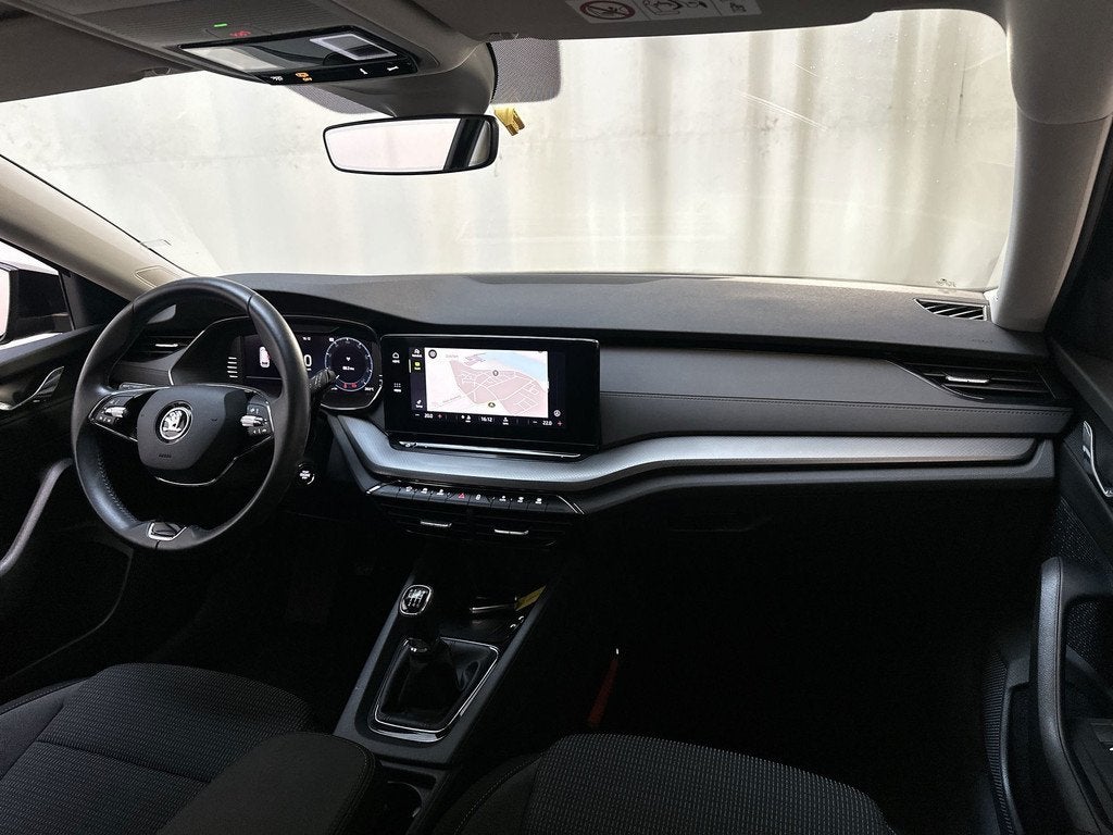 Skoda Octavia Combi 1.0 TSI Business Edition Navigatie Parke, Auto's, Skoda, Stof, Gebruikt, Met garantie (alle), Zwart