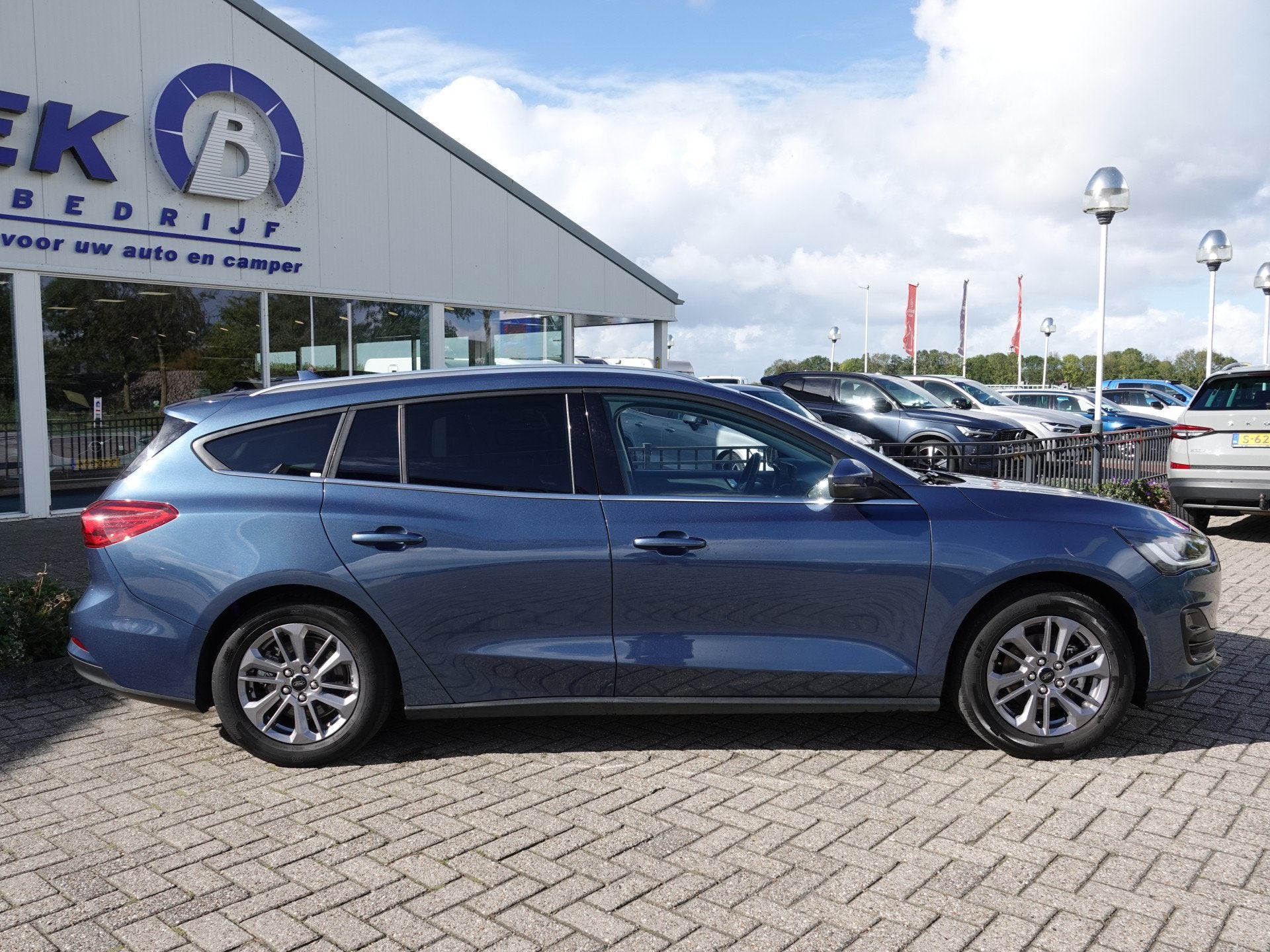Ford FOCUS Wagon 1.0 EcoBoost 155PK Hybrid Titanium AUTOM. |, Auto's, Stof, Gebruikt, Euro 6, Verwarmde buitenspiegels