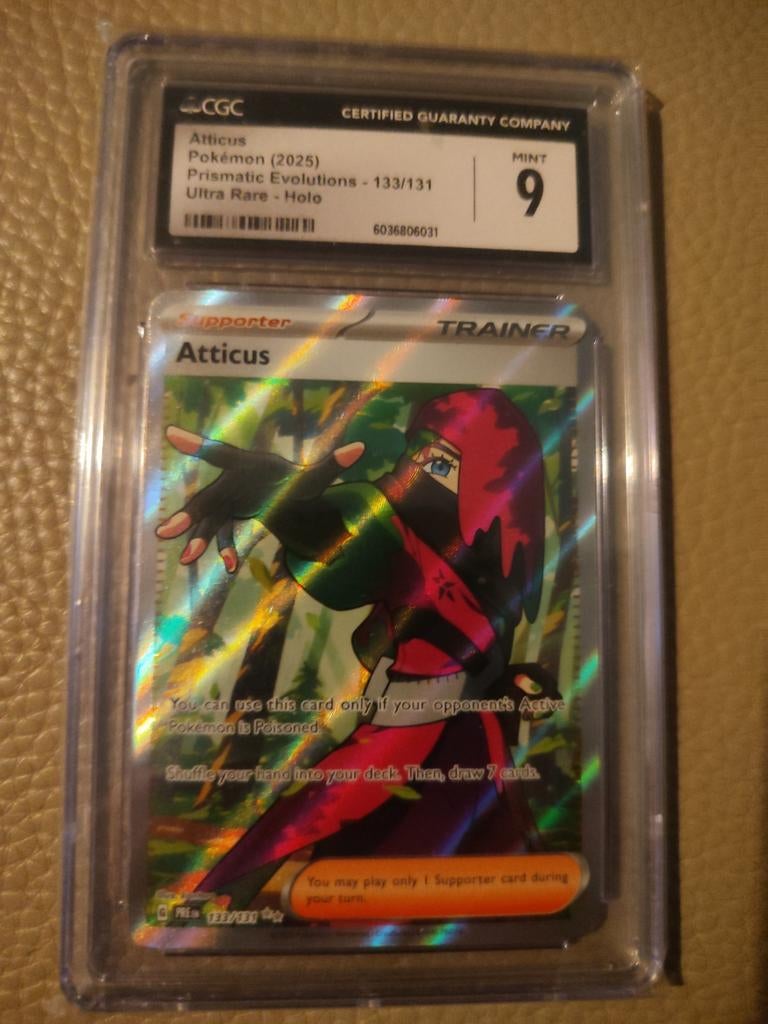 Atticus Pokémon Kaart CGC Mint 9 - Prismatic Evolutions, Ophalen of Verzenden, Zo goed als nieuw, Losse kaart, Foil