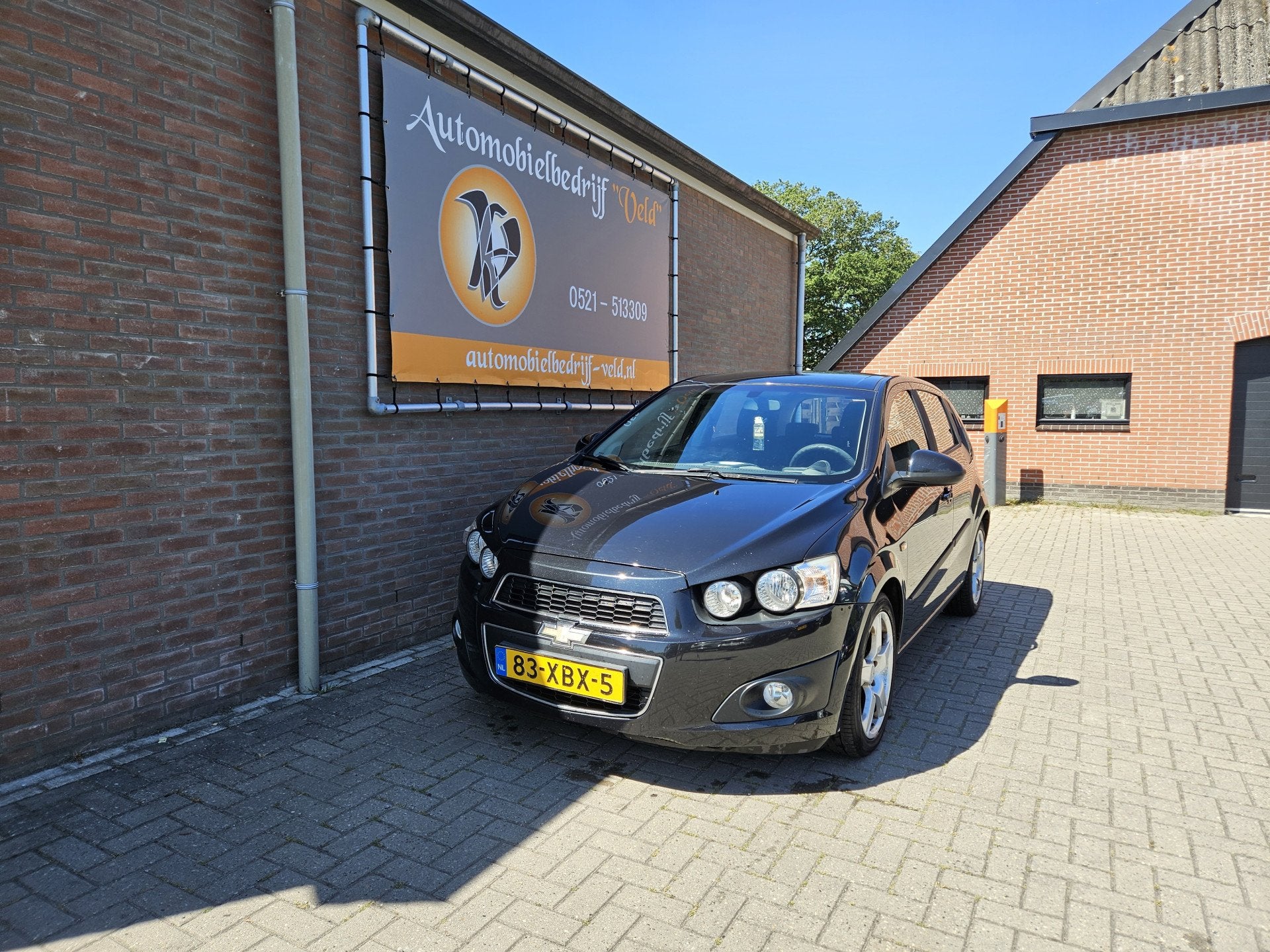 Chevrolet Aveo 1.3D LT (bj 2012), Auto's, Euro 5, Gebruikt, 4 cilinders, Zwart