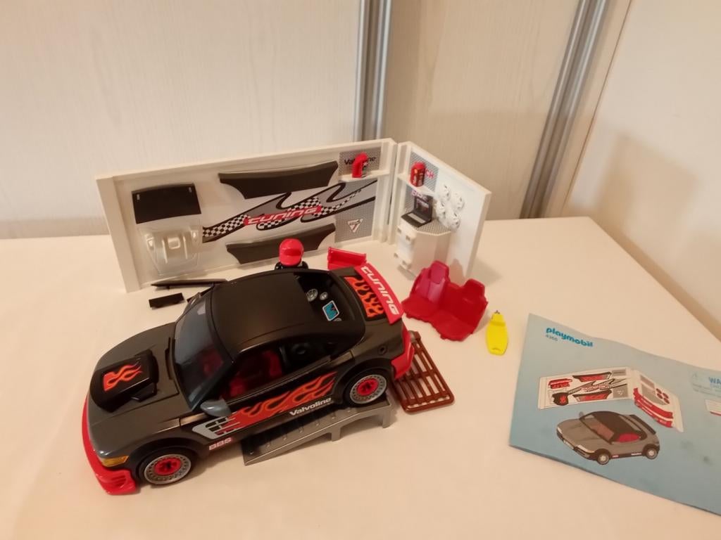 Playmobil 4366 zwarte sportwagen met muziek in shop complee, Ophalen of Verzenden, Gebruikt, Complete set