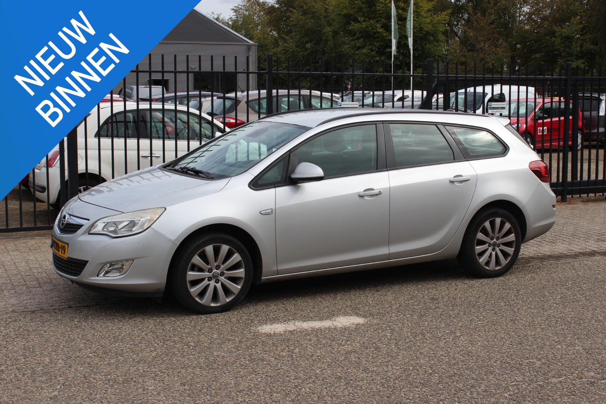 Opel Astra Sports Tourer 1.4 Turbo Sport, Auto's, Voorwielaandrijving, Euro 5, Stof, Gebruikt