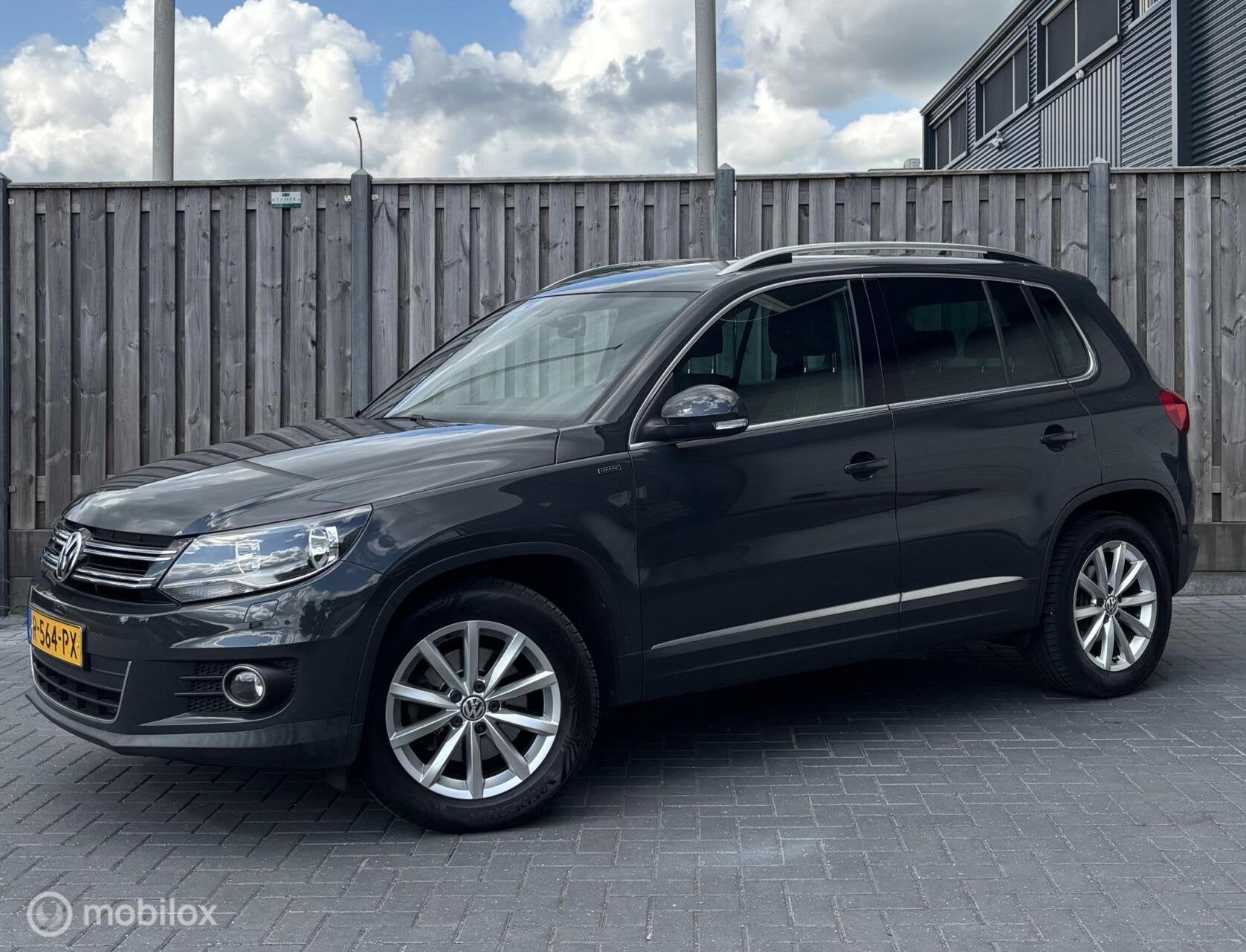 Volkswagen Tiguan 1.4 TSI Sport&Style/STOELVW/NAVI/PDC/, Auto's, Voorwielaandrijving, Euro 5, Gebruikt, 4 cilinders