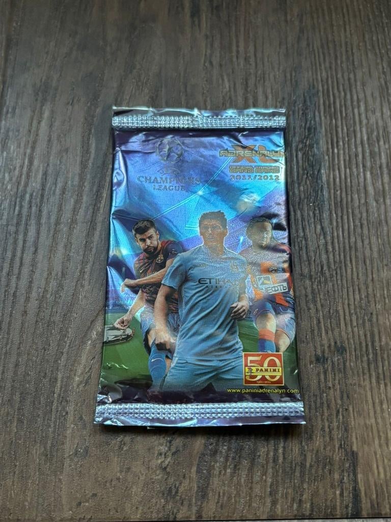 Dicht pakje Panini Adrenalyn XL 2011-2012 Champions League, Ophalen of Verzenden, Gebruikt, Buitenlandse clubs, Poster, Plaatje of Sticker