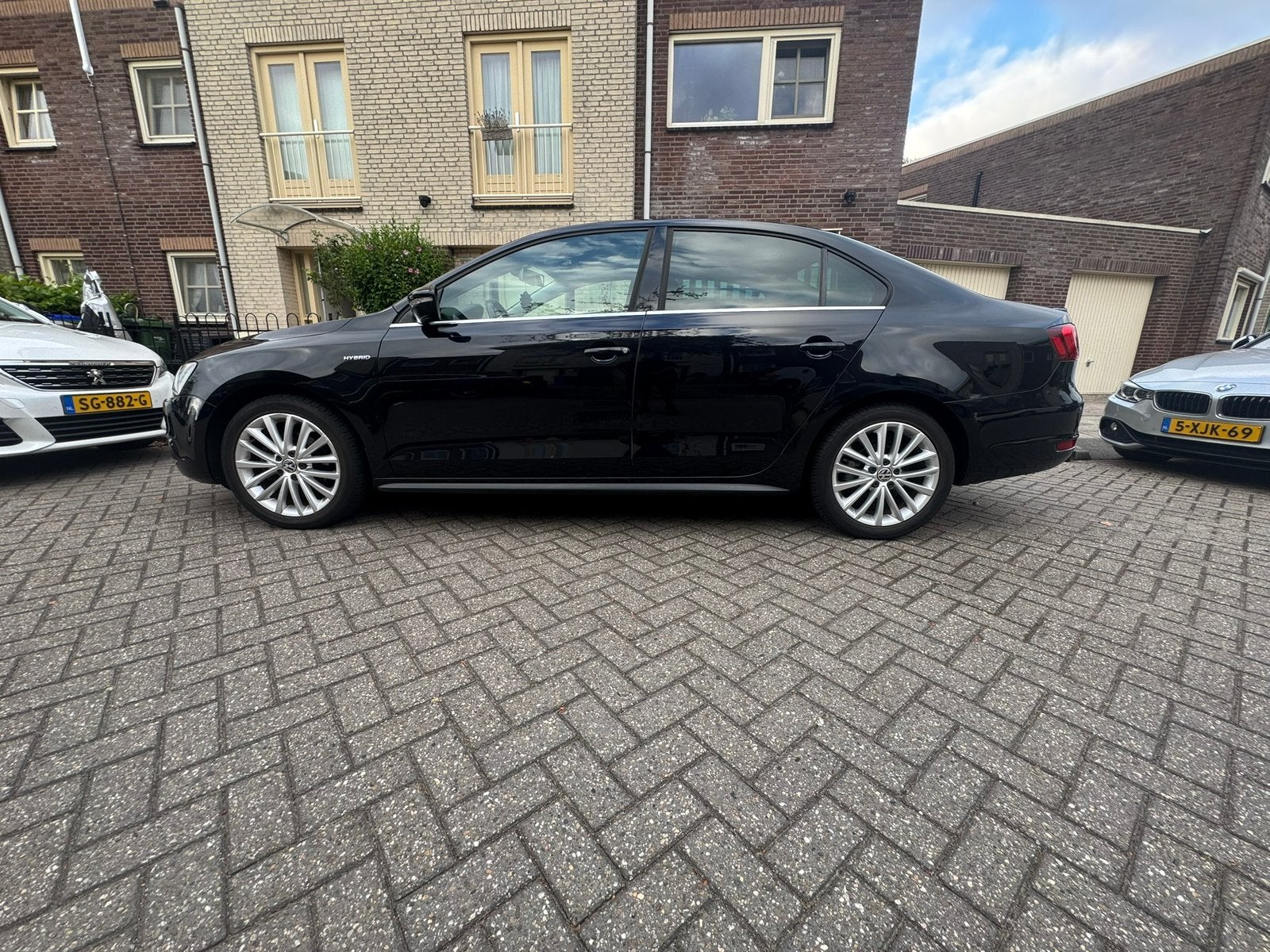 Volkswagen Jetta 1.4 TSI Hybrid 170pk 7-DSG 2013 Zwart, Auto's, Volkswagen, Stof, Zwart, Origineel Nederlands, Hybride Elektrisch/Benzine