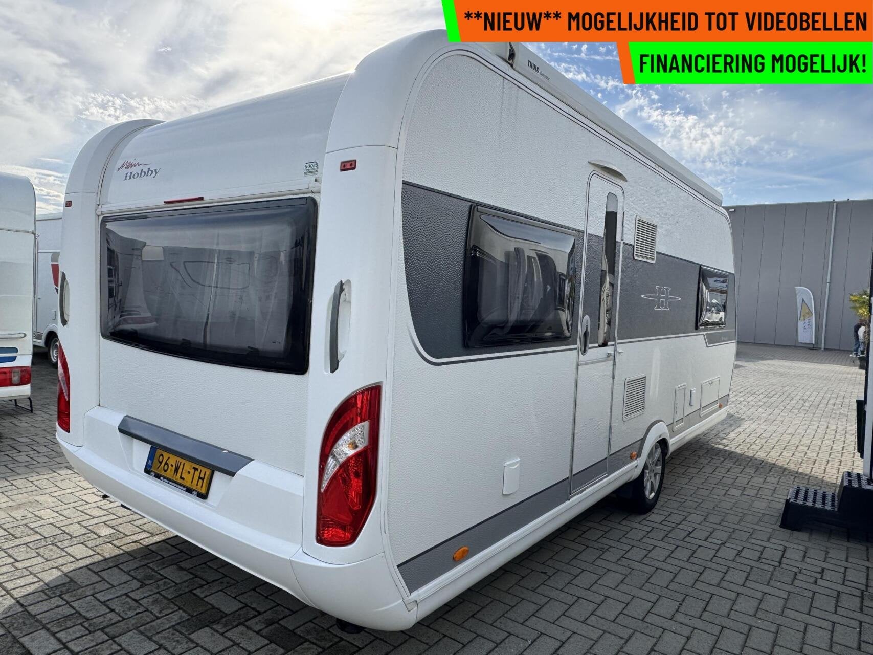 Hobby 560 UL PRESTIGE, ENKELE BEDDEN, RONDZIT, LUIFEL, MOVER, Caravans en Kamperen, Rondzit, Hobby, 7 tot 8 meter, Bedrijf