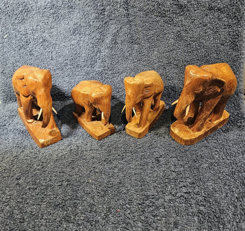 set van 4 handgesneden teakhouten olifanten, Ophalen of Verzenden, Zo goed als nieuw, Dier