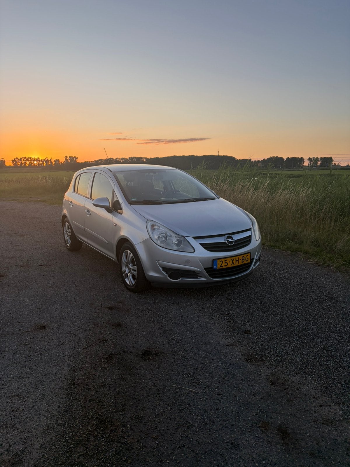 Opel Corsa 1.2 16V 5D WR 2007 Grijs, Voorwielaandrijving, 4 cilinders, 1229 cc, 49 €/maand