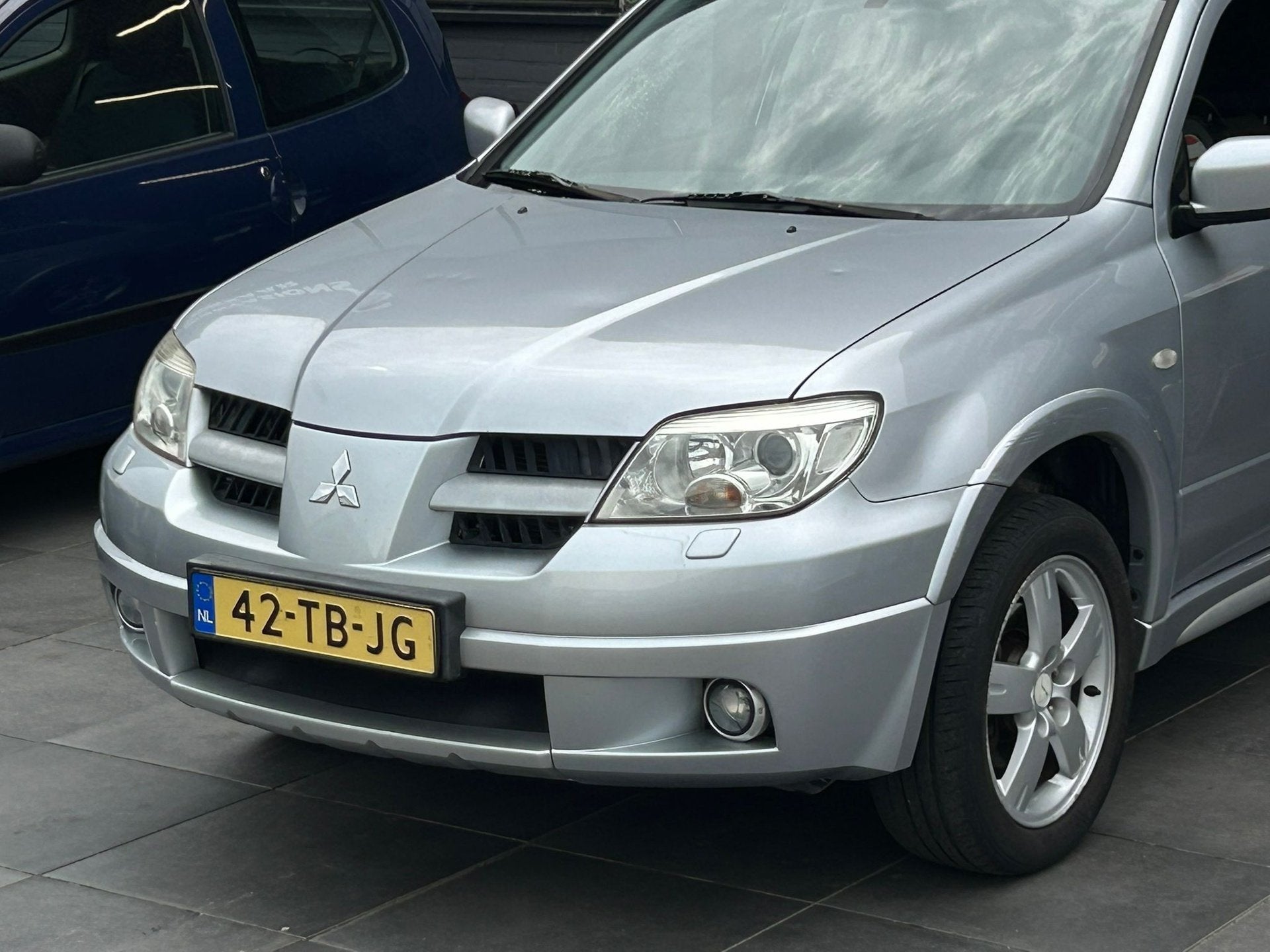 Mitsubishi Outlander Sport 2.4 Invite Scott 4WD|1e Eig|NAP, Auto's, Stof, Huisgarantie, 4 cilinders, Met garantie (alle)