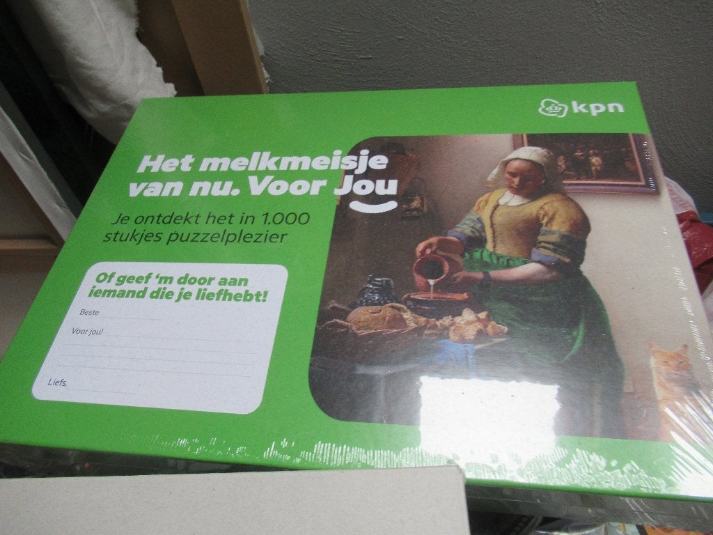 puzzel KPN - het MELKMEISJE, nieuw in folie, Ophalen of Verzenden, 500 t/m 1500 stukjes, Nieuw, Legpuzzel